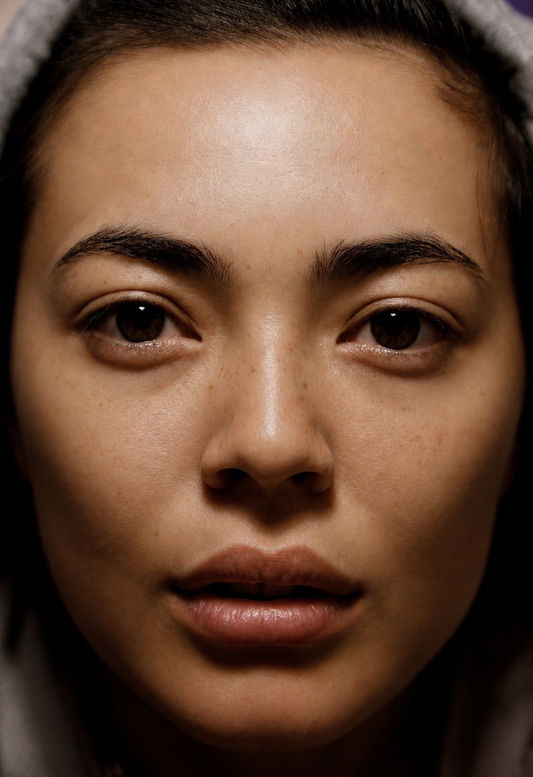 Extreme close-up beauty portrait, natural skin and freckles